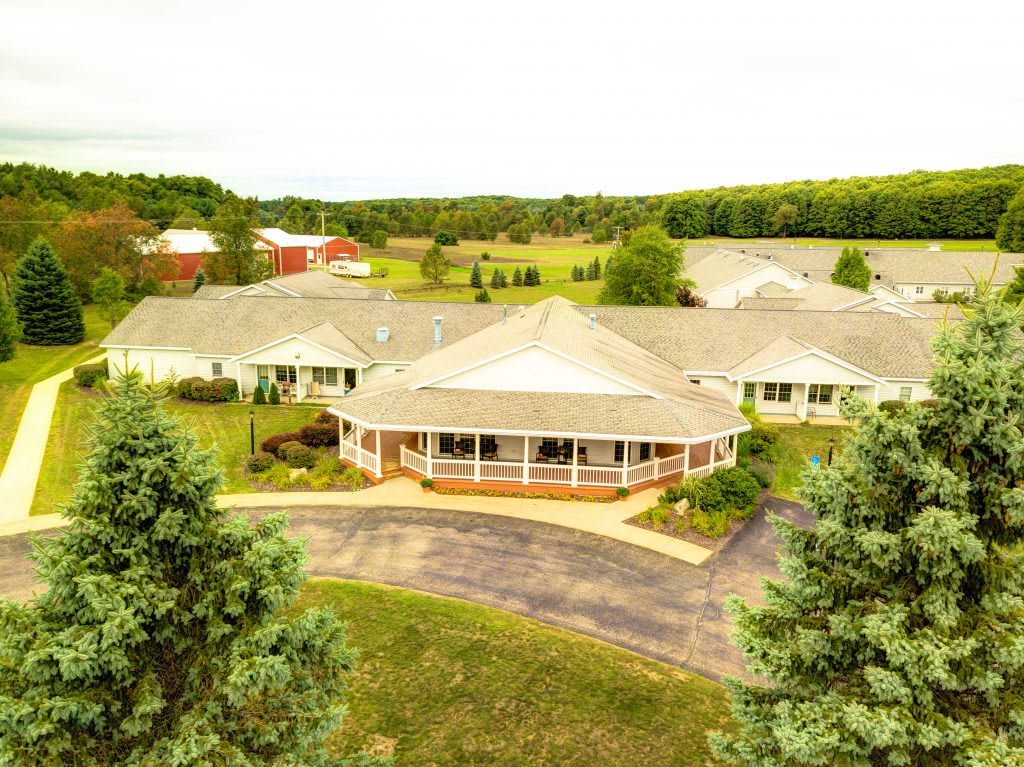 Curry House aerial view of community